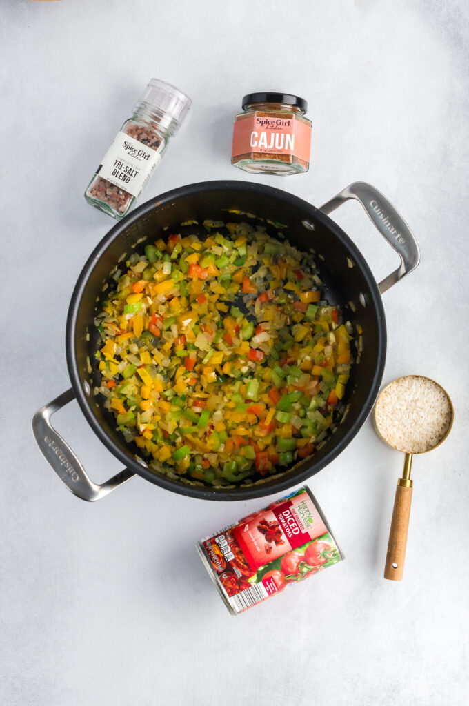 softening the vegetables in a pot