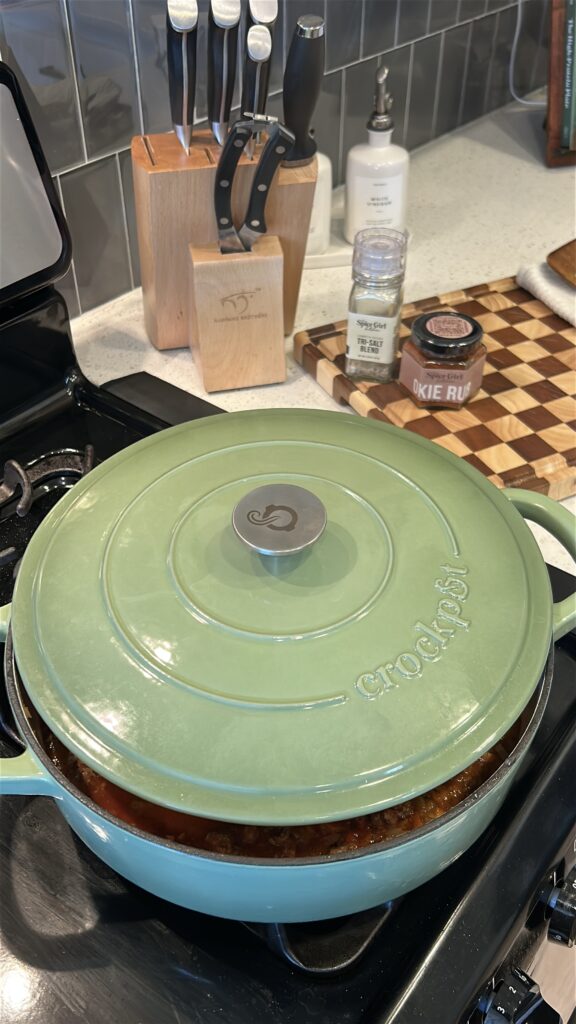 Sloppy joes simmering in skillet until thickened