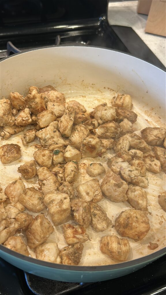 Cajun-seasoned chicken cooked until golden brown for creamy Cajun chicken pasta