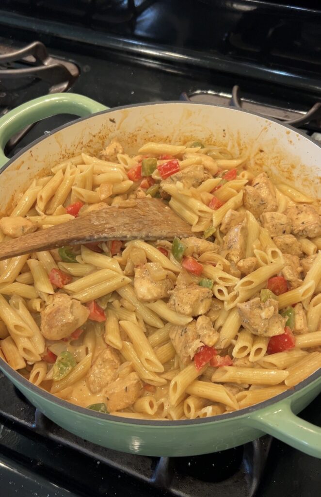 Penne pasta and Cajun chicken tossed in creamy Parmesan sauce