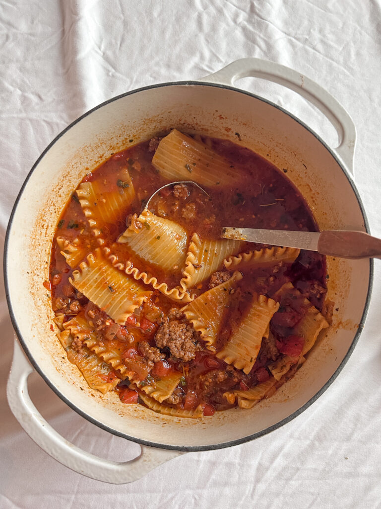 Close-up of lasagna soup showing noodles and beef