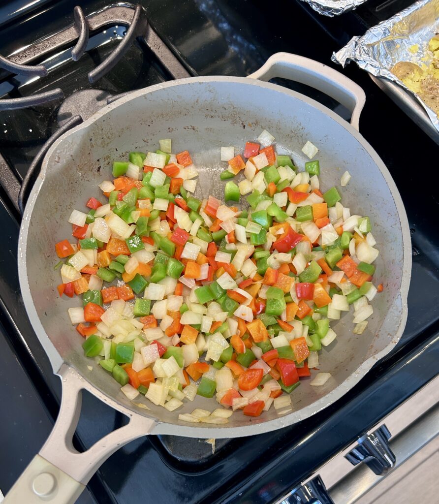 Sautéing onion and peppers for Cuban picadillo
