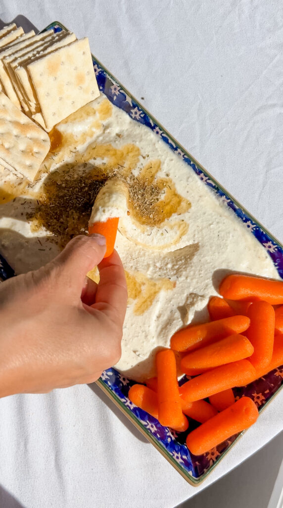 close up of smooth whipped feta texture on a spoon