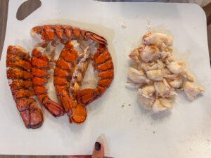 chopped lobster meat and reserved shells for bisque