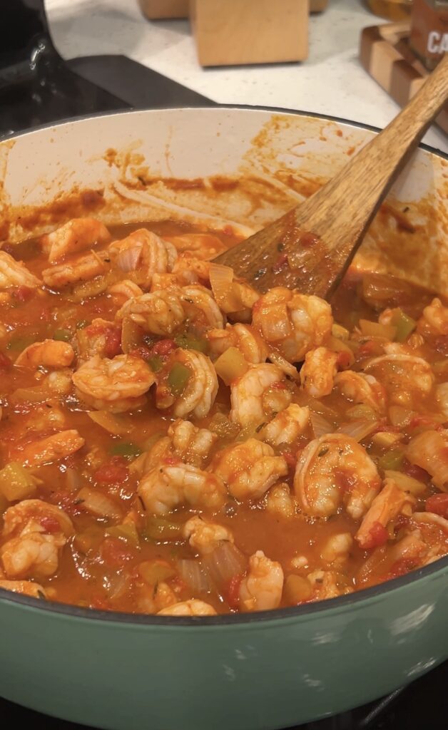 Shrimp cooking in Creole tomato sauce
