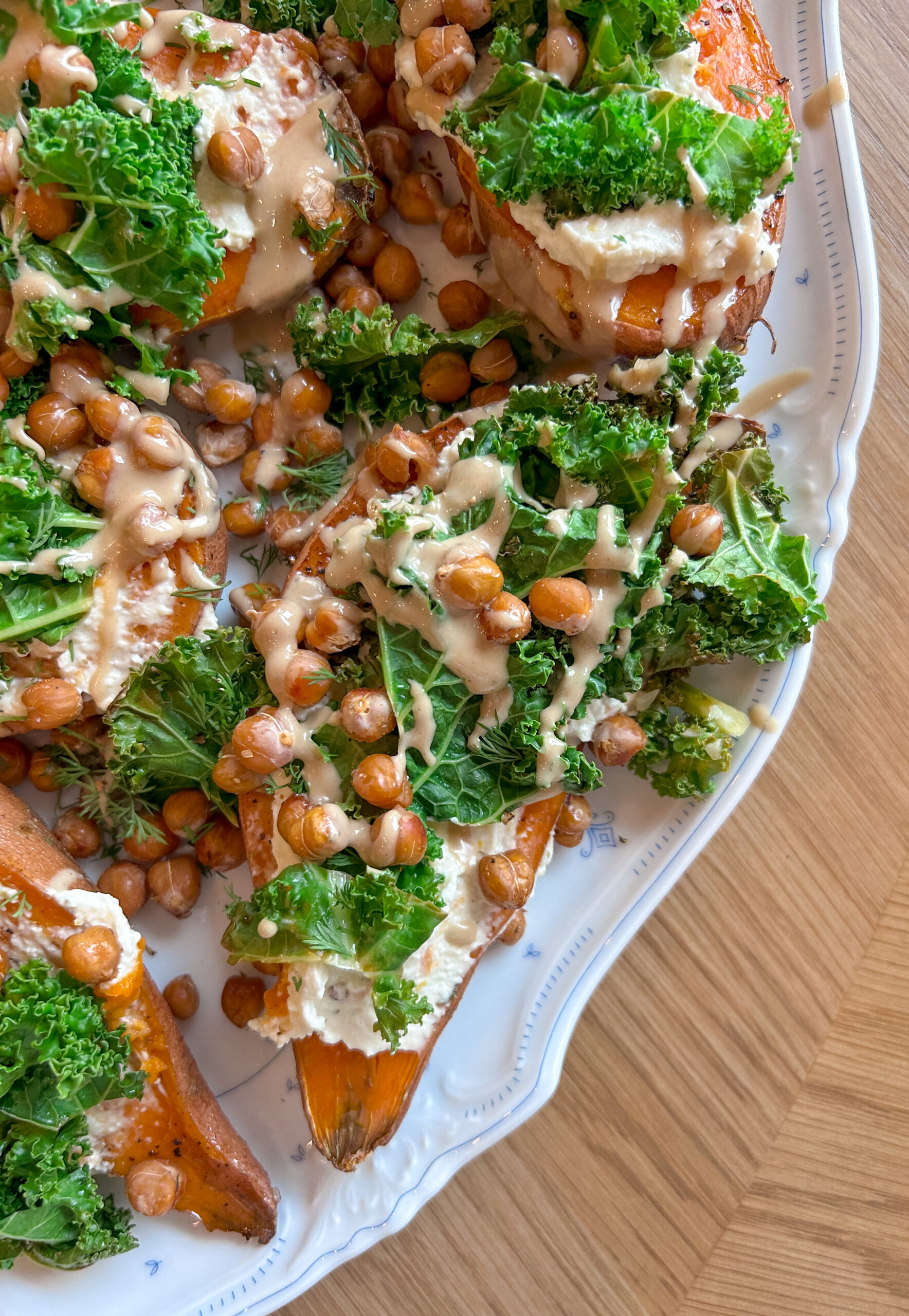 Greek sweet potato boats with feta, crispy chickpeas, and kale