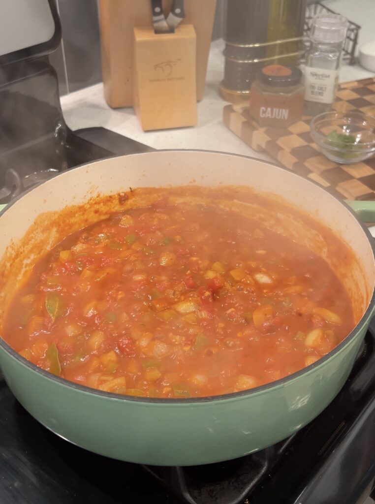 Tomato Creole sauce simmering with vegetables