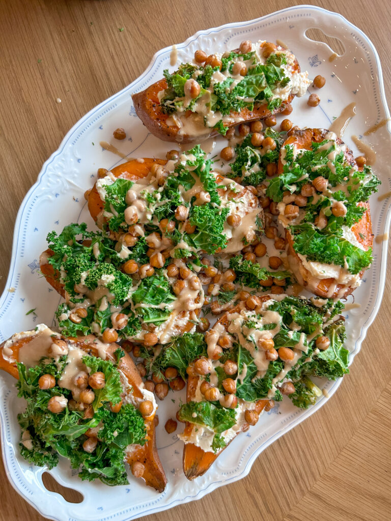 sweet potato boats with tahini drizzle and herbs