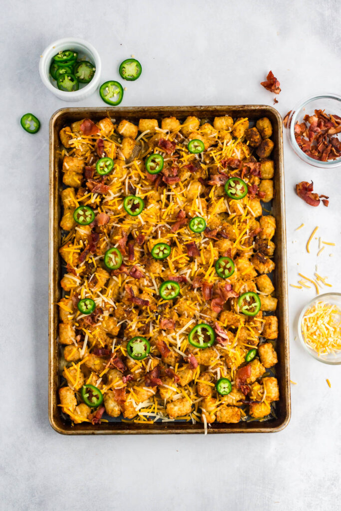 tachos assembled on a sheet pan ready to bake