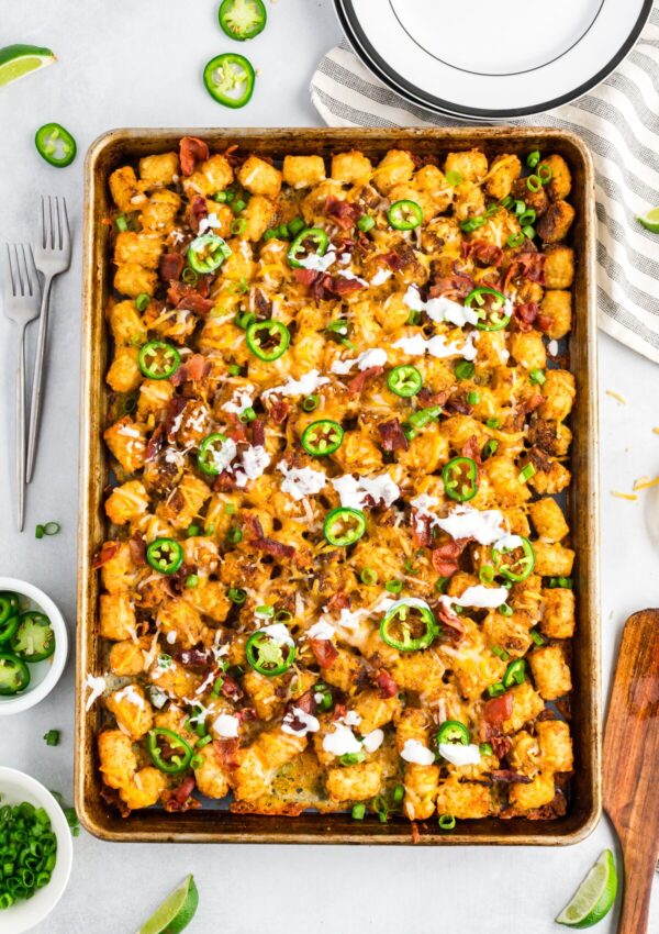 sheet pan tater tot nachos on a white countertop