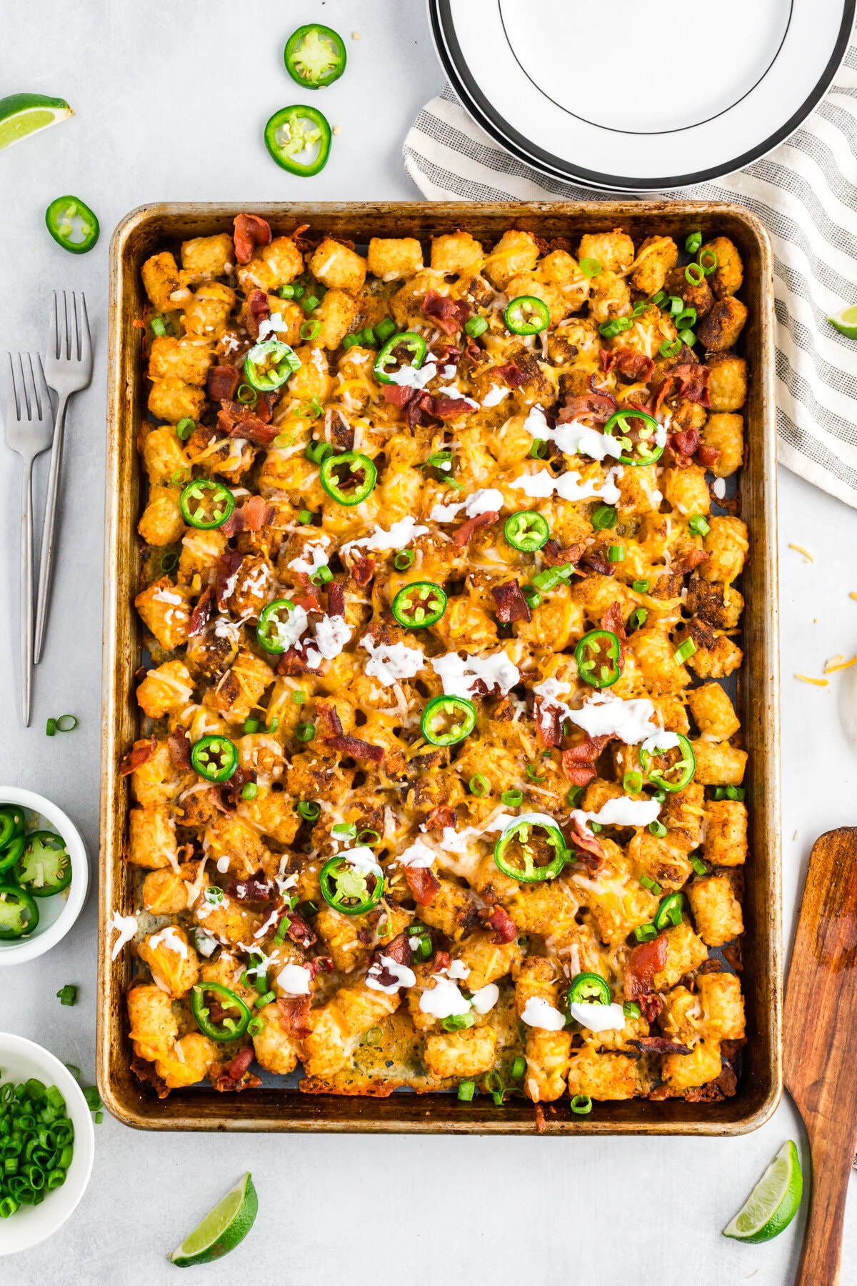 sheet pan tater tot nachos on a white countertop