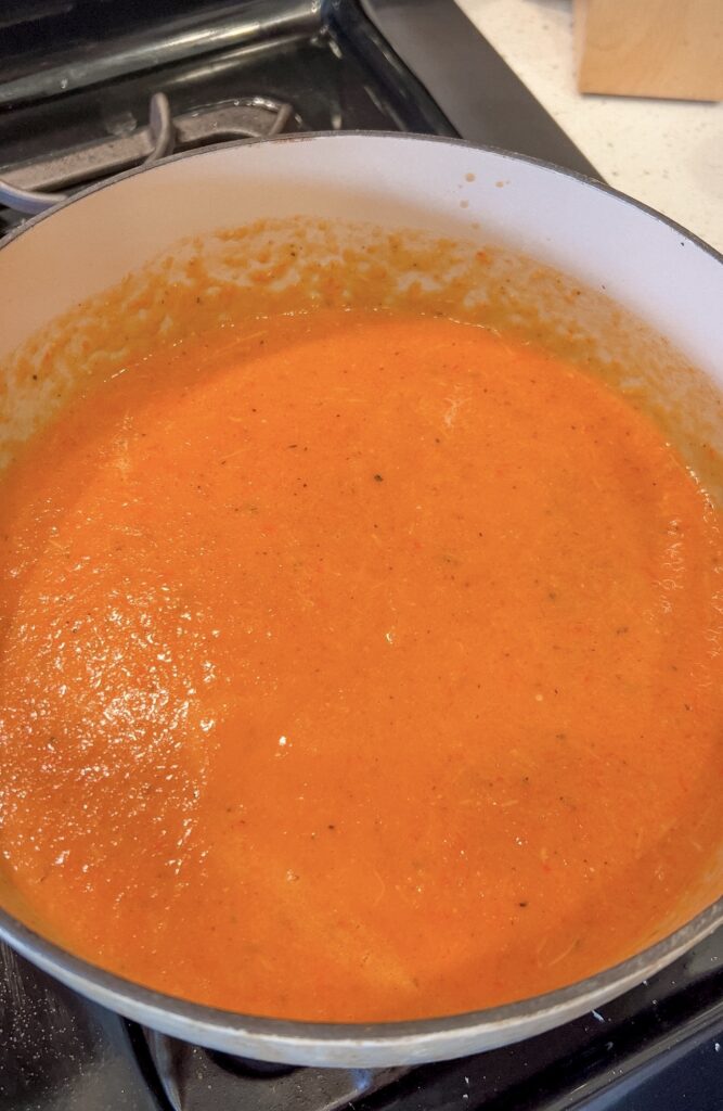Heavy cream and freshly grated Parmesan stirred into roasted red pepper and tomato soup