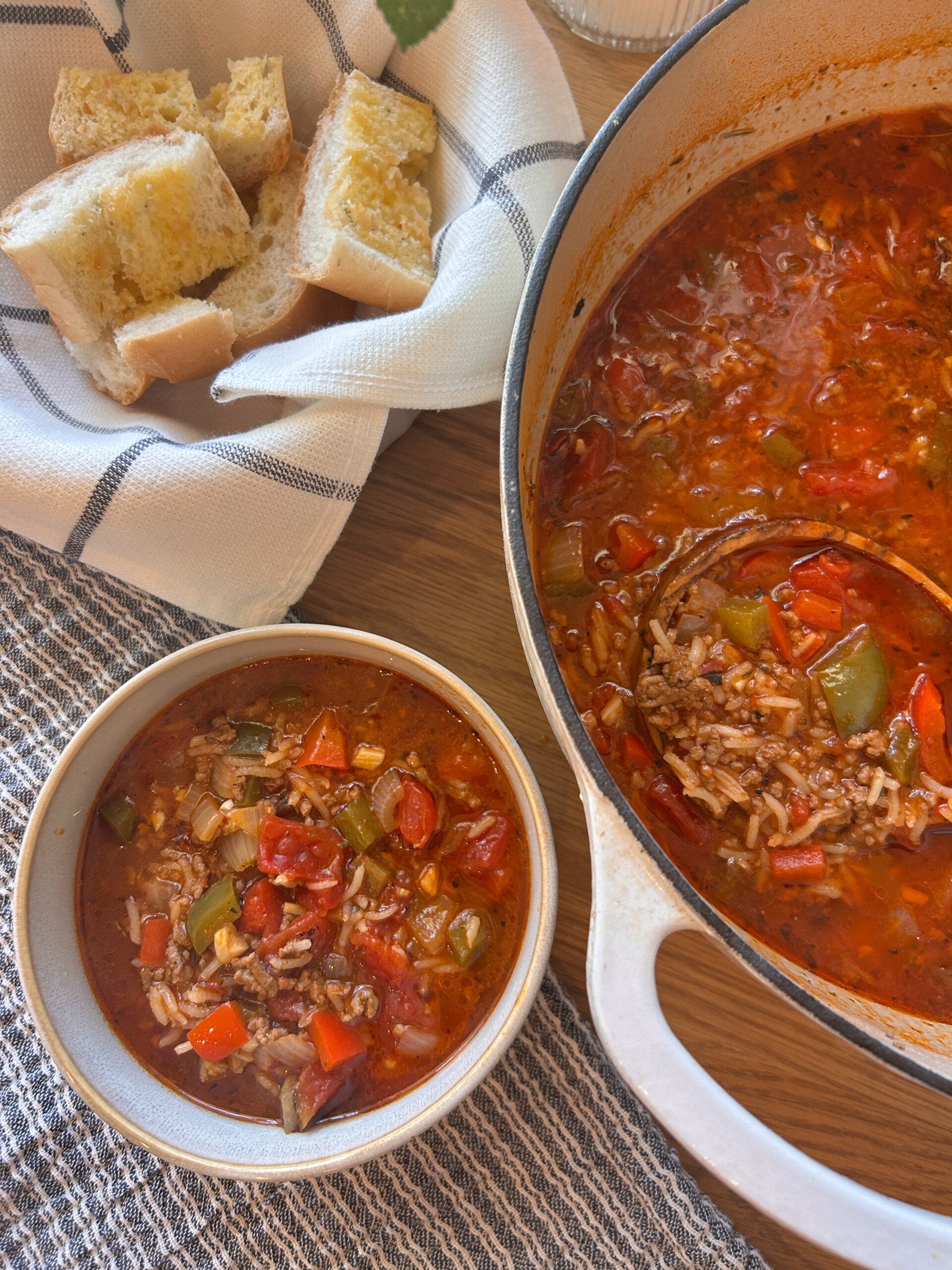 Unstuffed bell pepper soup served with crusty bread