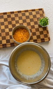 Mixing wet ingredients for jalapeño cheddar cornbread