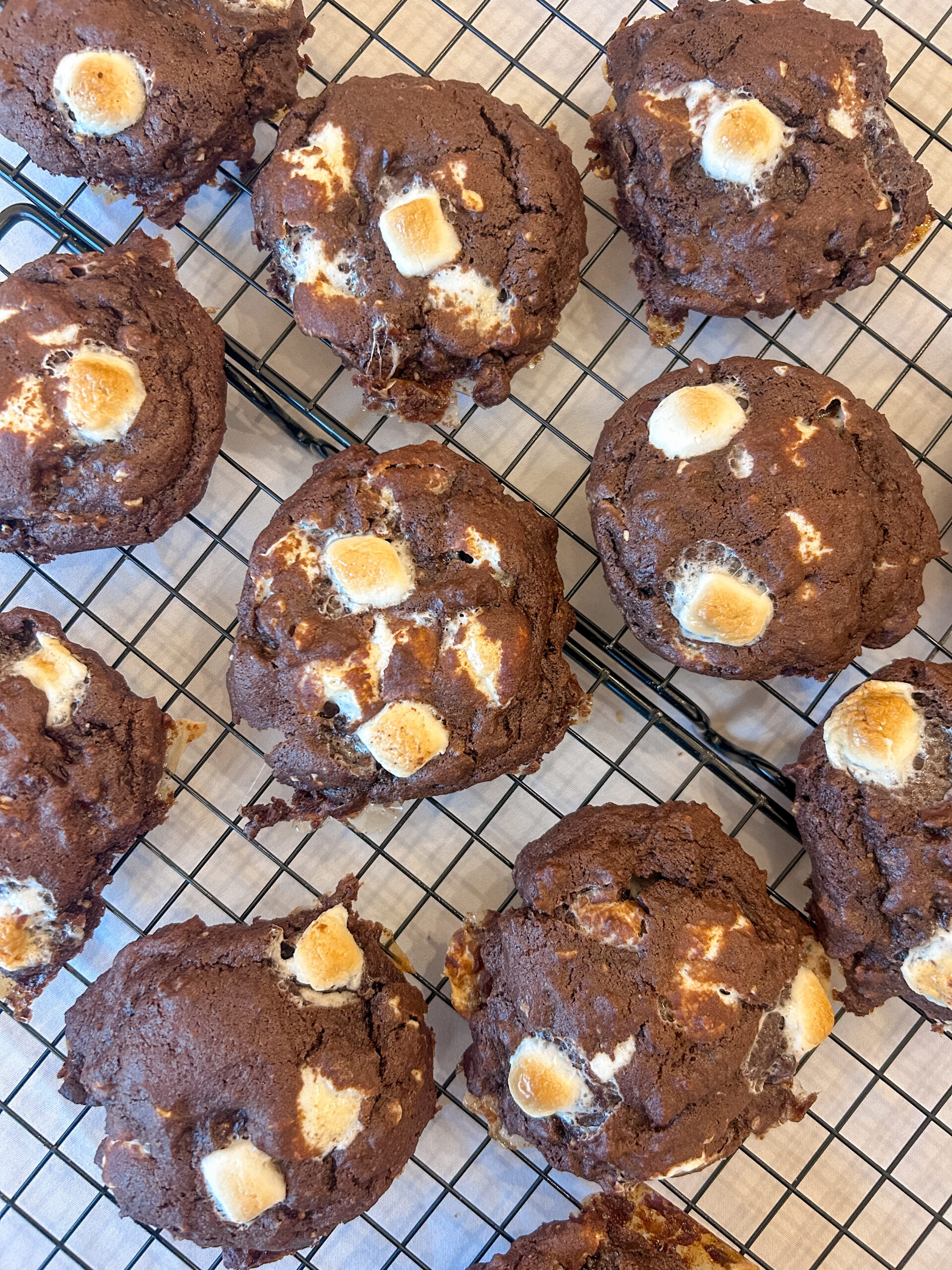 Thick rocky road cookies with gooey marshmallows and chocolate chunks