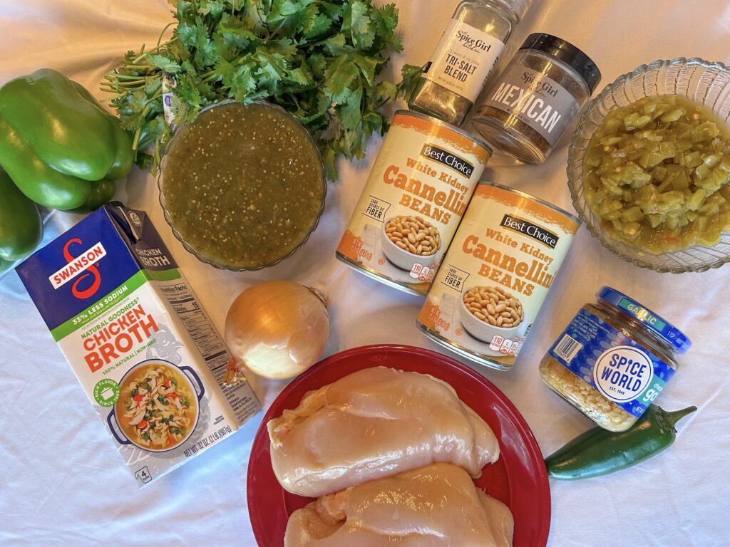 Ingredients for green chile chicken stew laid out on a table