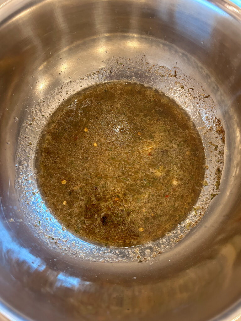 mixing the marinade for jerk shrimp skewers