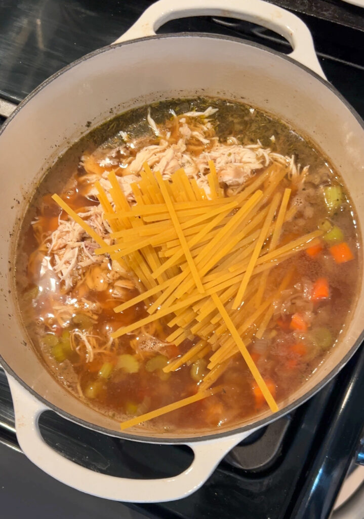 Adding noodles to stove top chicken noodle soup