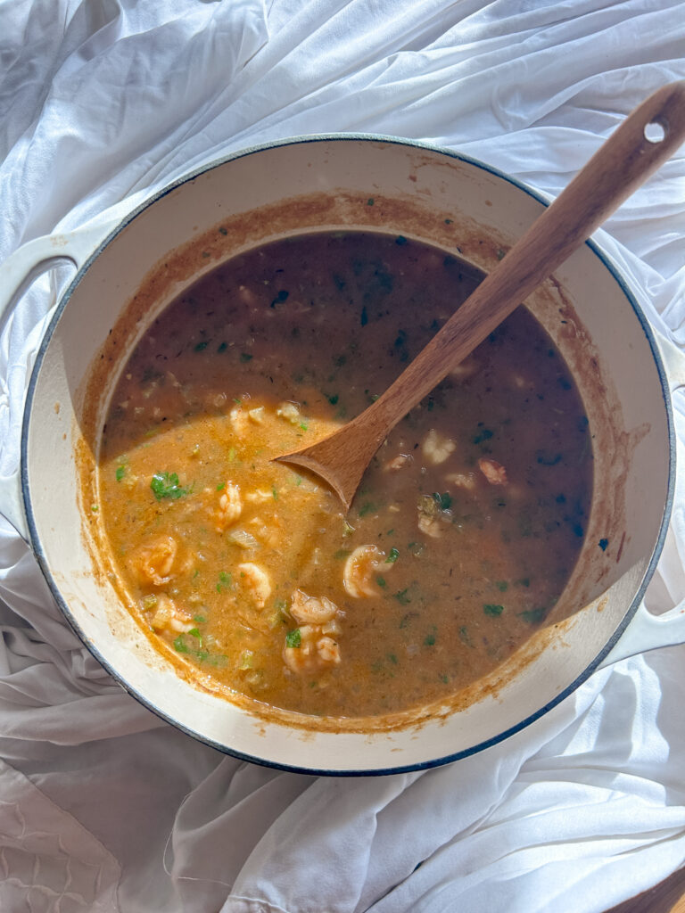 Wide hero shot of shrimp etouffee served with rice