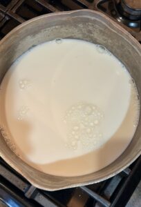 steaming milk for eggnog hot chocolate