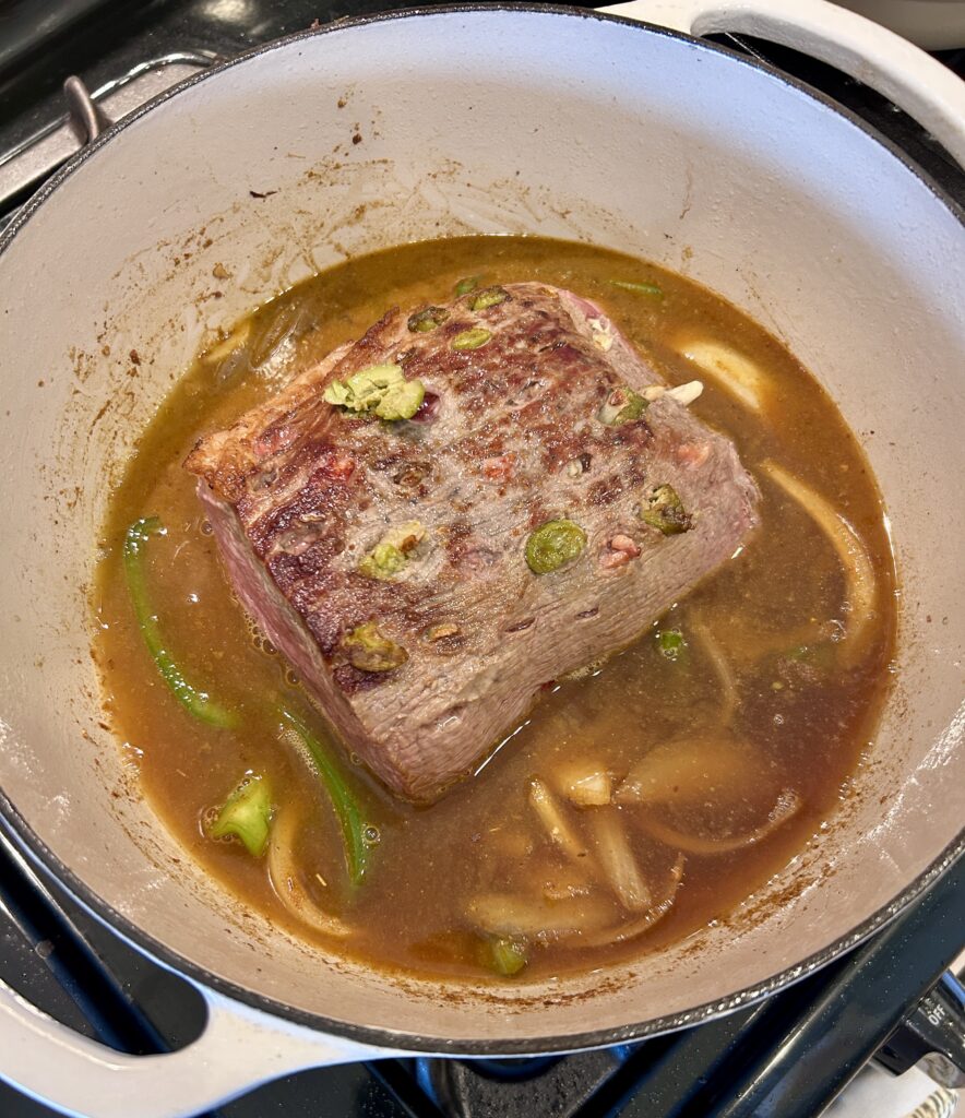 Boliche criollo slow braising in citrus garlic sauce