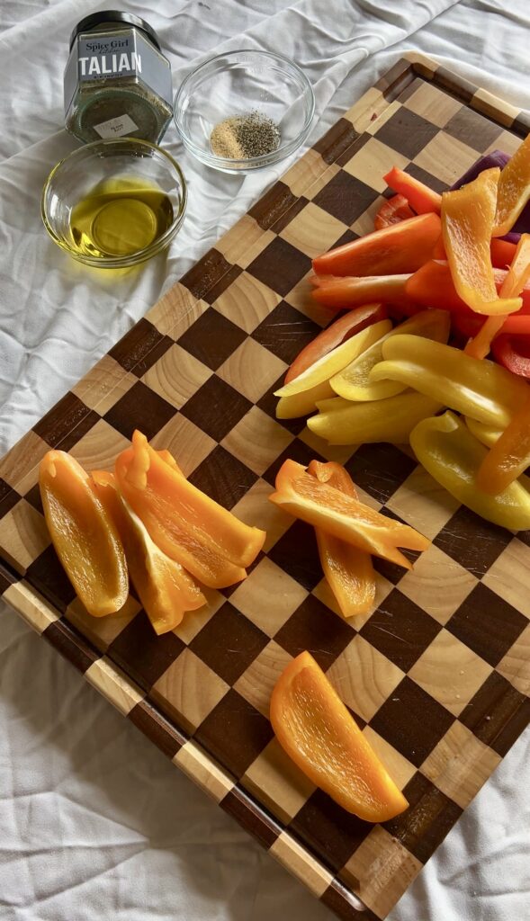 prep sausage peppers and onions for sheet pan dinner