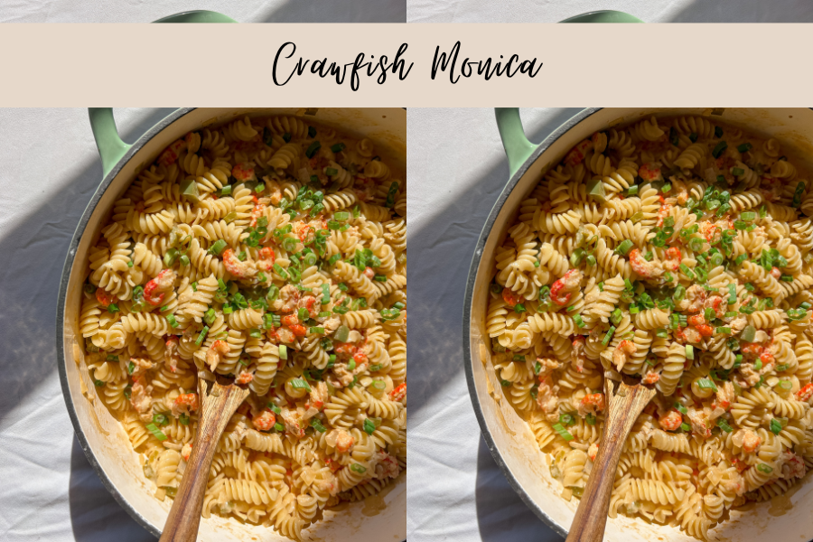 Crawfish Monica in skillet with creamy Cajun sauce and green onions