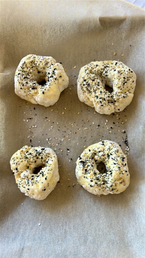 Adding everything seasoning to greek yogurt bagels