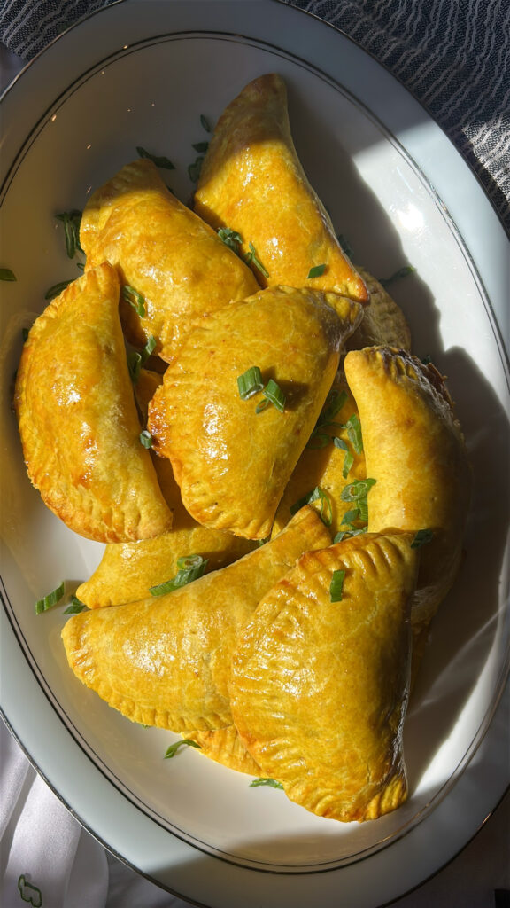 Authentic Jamaican meat pie recipe served warm with flaky crust