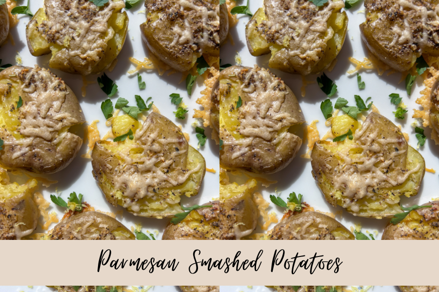 crispy parmesan smashed potatoes with golden cheese crust on baking sheet