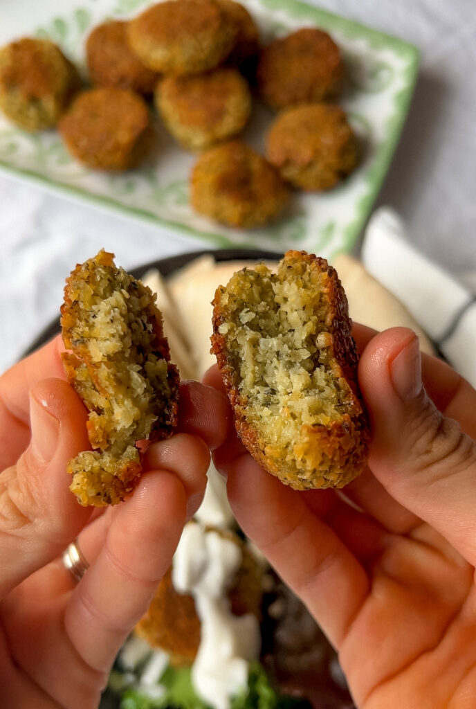 inside of baked falafel showing soft herby texture