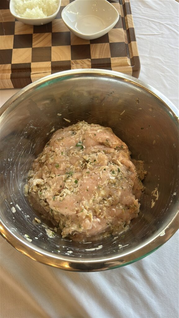 mixing turkey meatball mixture for italian wedding soup