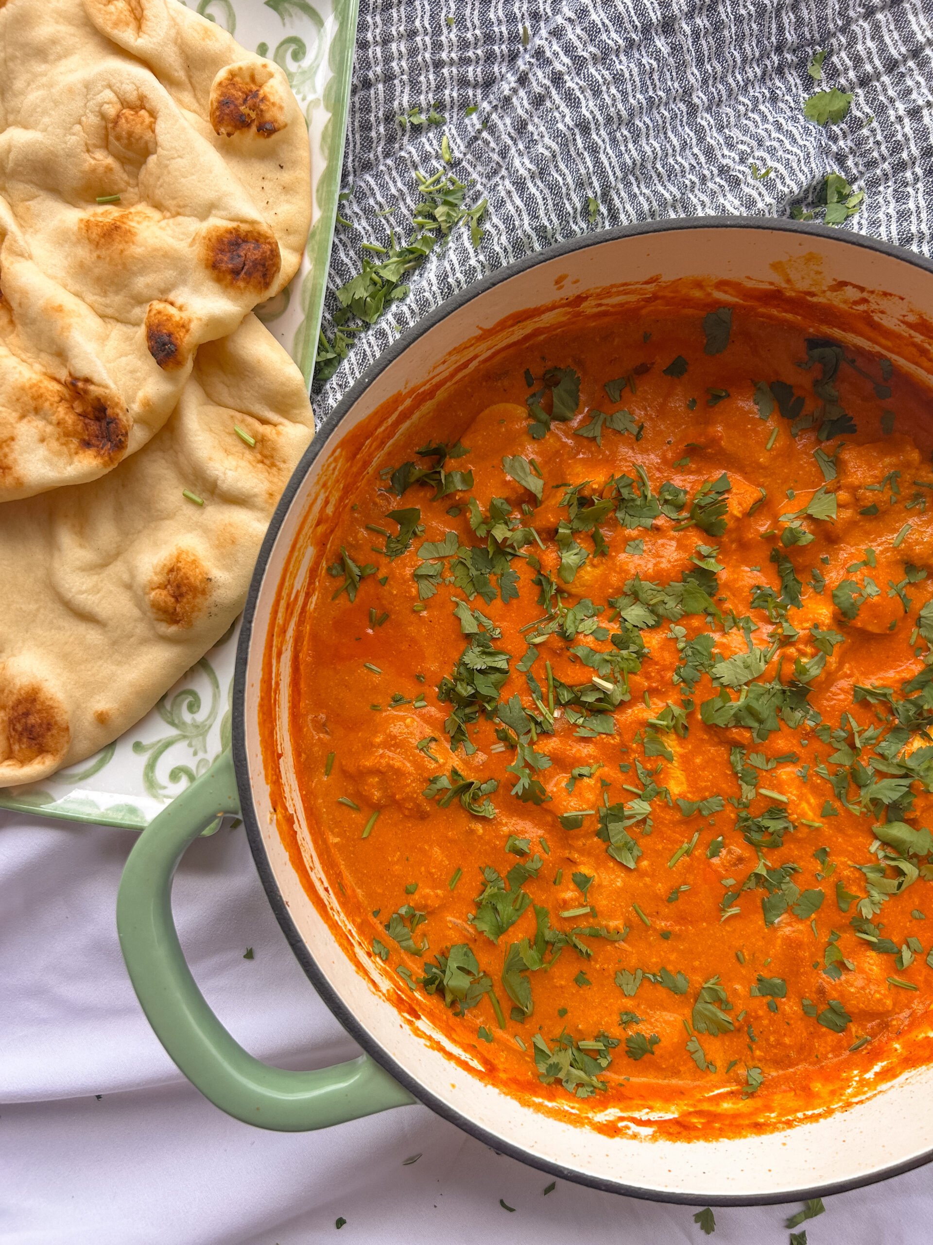Chicken tikka masala served with rice and naan