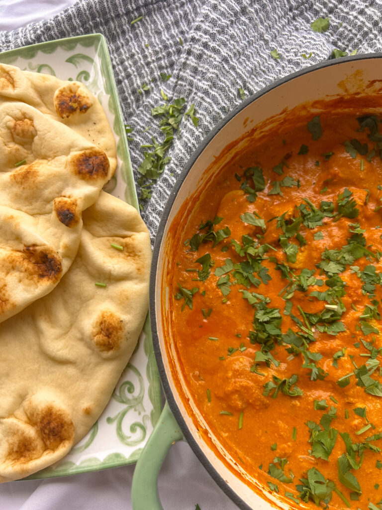 Chicken tikka masala served with naan