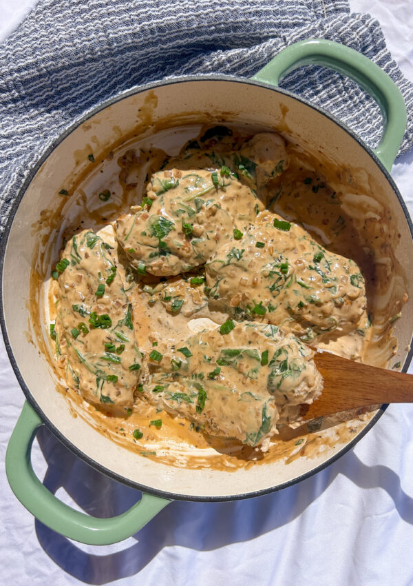 creamy boursin chicken in skillet with garlic herb sauce