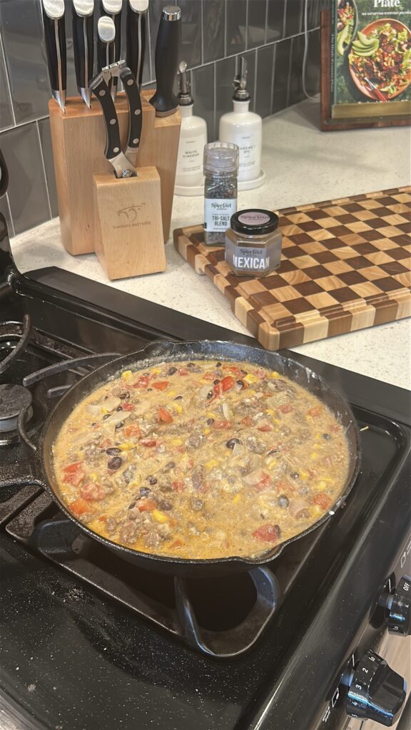 creamy beef filling for mexican cornbread casserole with beans and corn