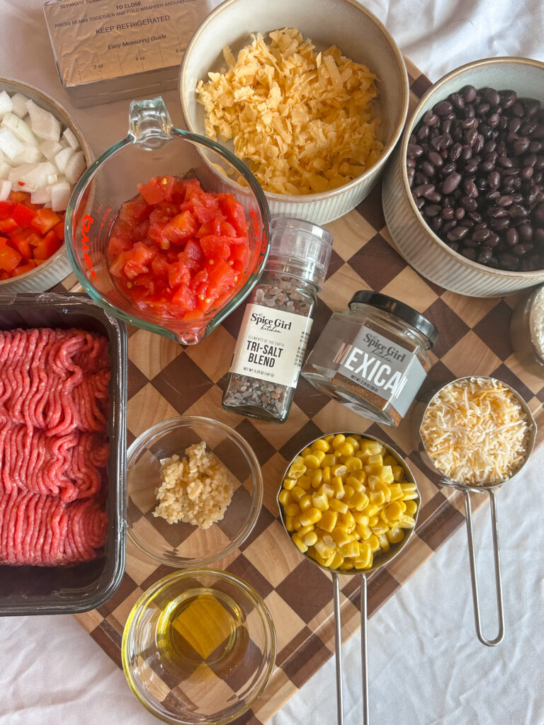 ingredients for mexican cornbread casserole with ground beef and cornbread topping