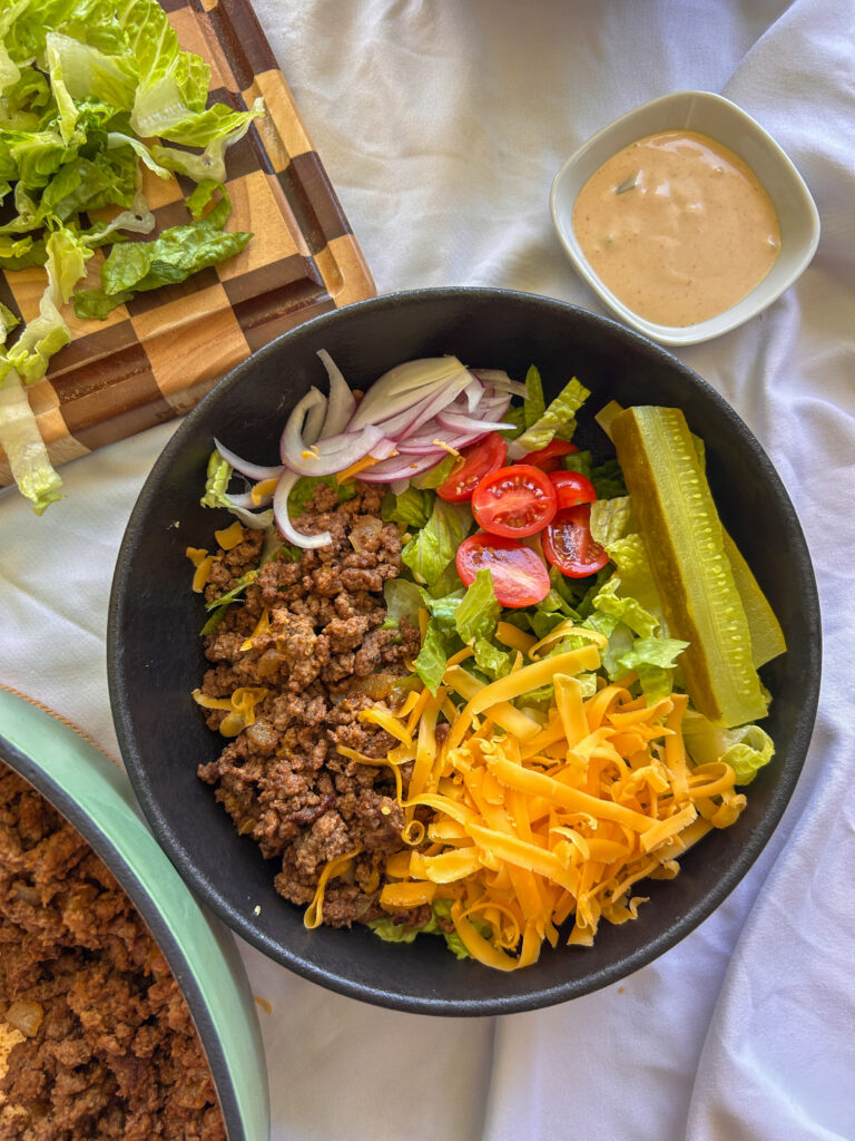 Loaded cheeseburger bowl with special sauce and fresh toppings