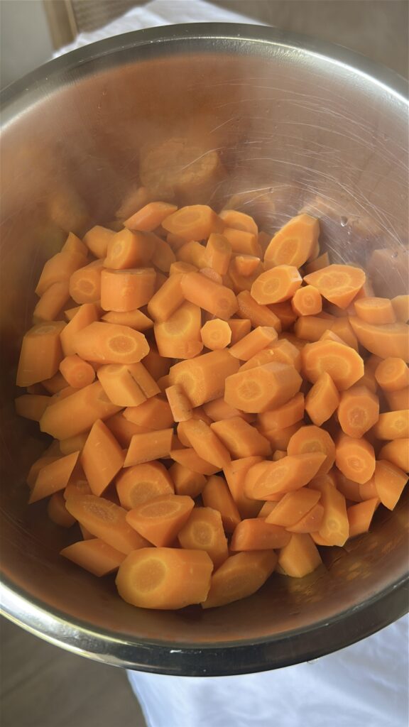 Tender cooked carrots prepared for Moroccan carrot salad