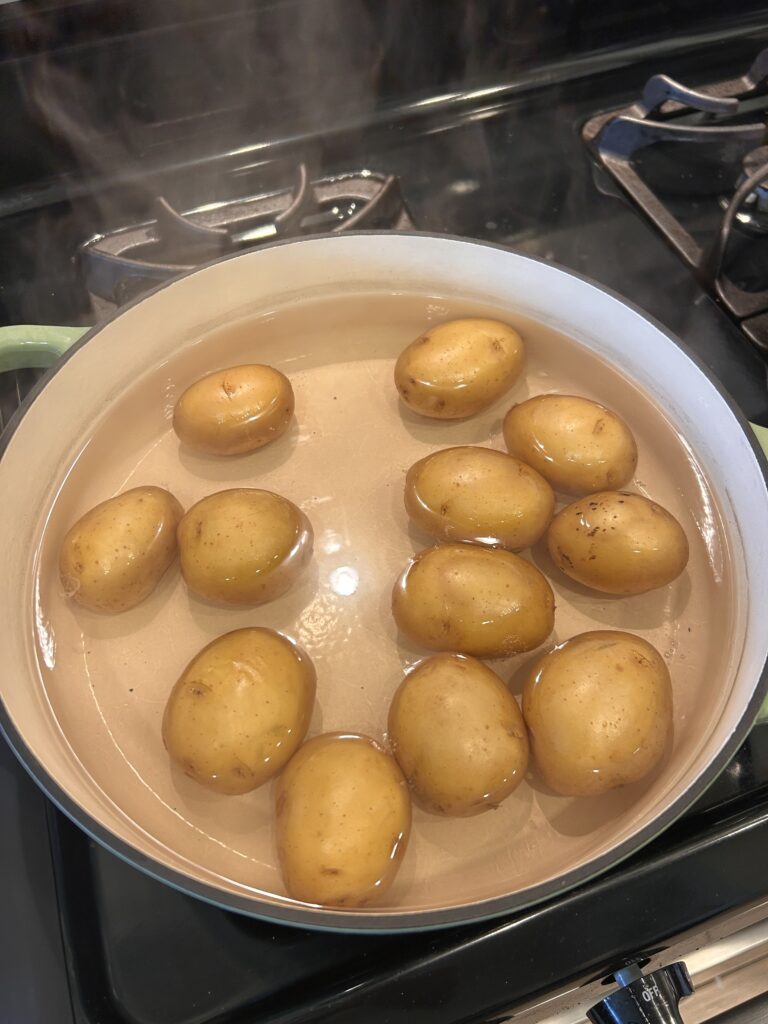 Boiled Yukon Gold potatoes ready for French potato salad