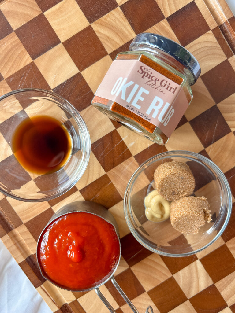 Ingredients for meatloaf glaze including ketchup, brown sugar, Worcestershire sauce, Dijon mustard, and seasonings