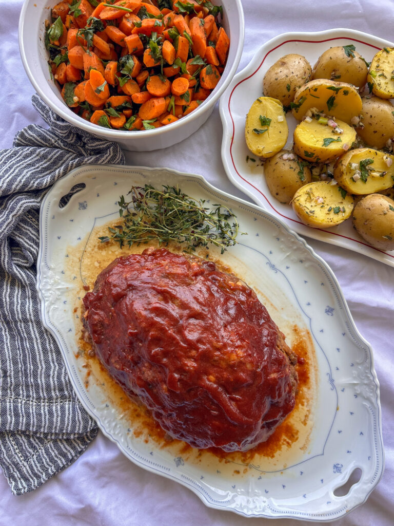 Crockpot meatloaf served with homemade glaze and ready to enjoy