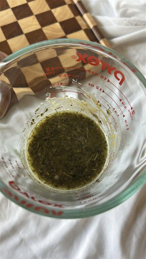 Dijon vinaigrette whisked with olive oil, champagne vinegar, garlic, lemon juice, and Herbes de Provence