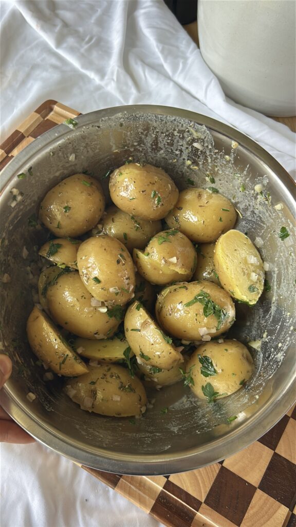 Fresh parsley, chives, scallions, and shallots added to French potato salad