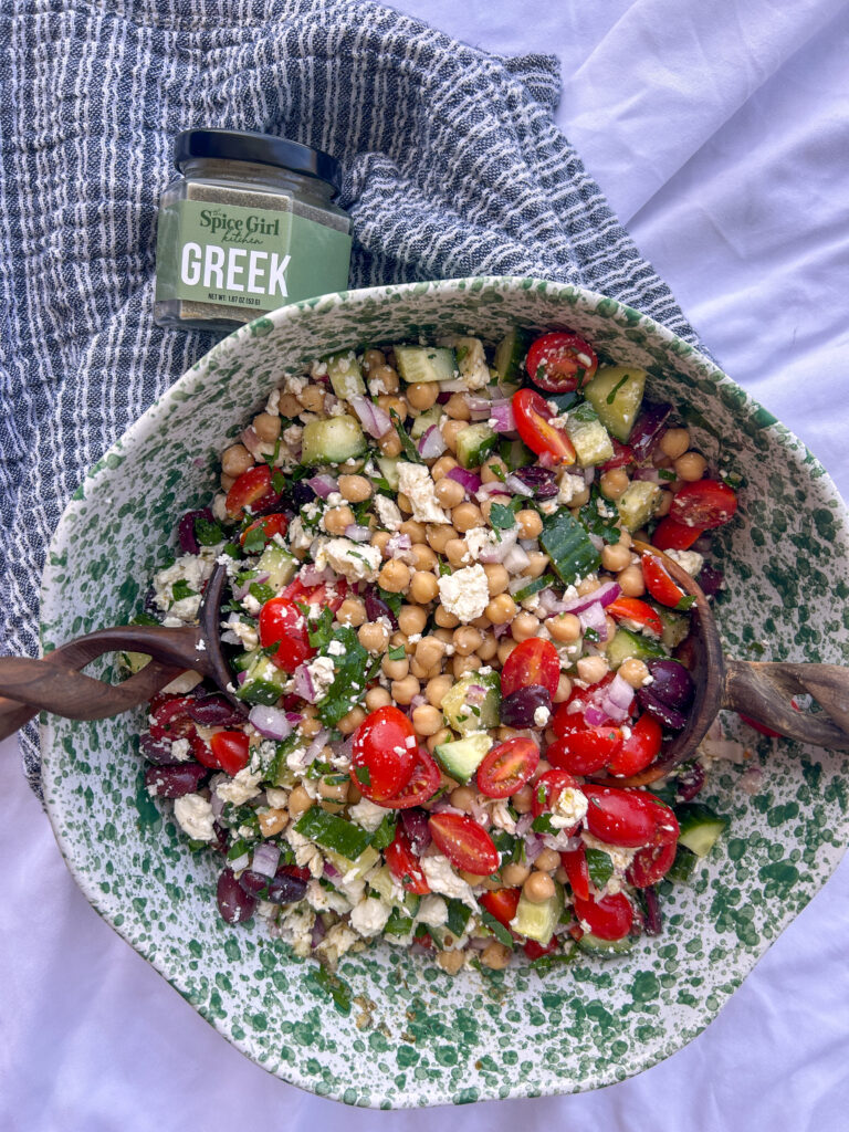 Greek chickpea feta salad with The Spice Girl Kitchen Greek Seasoning on the side