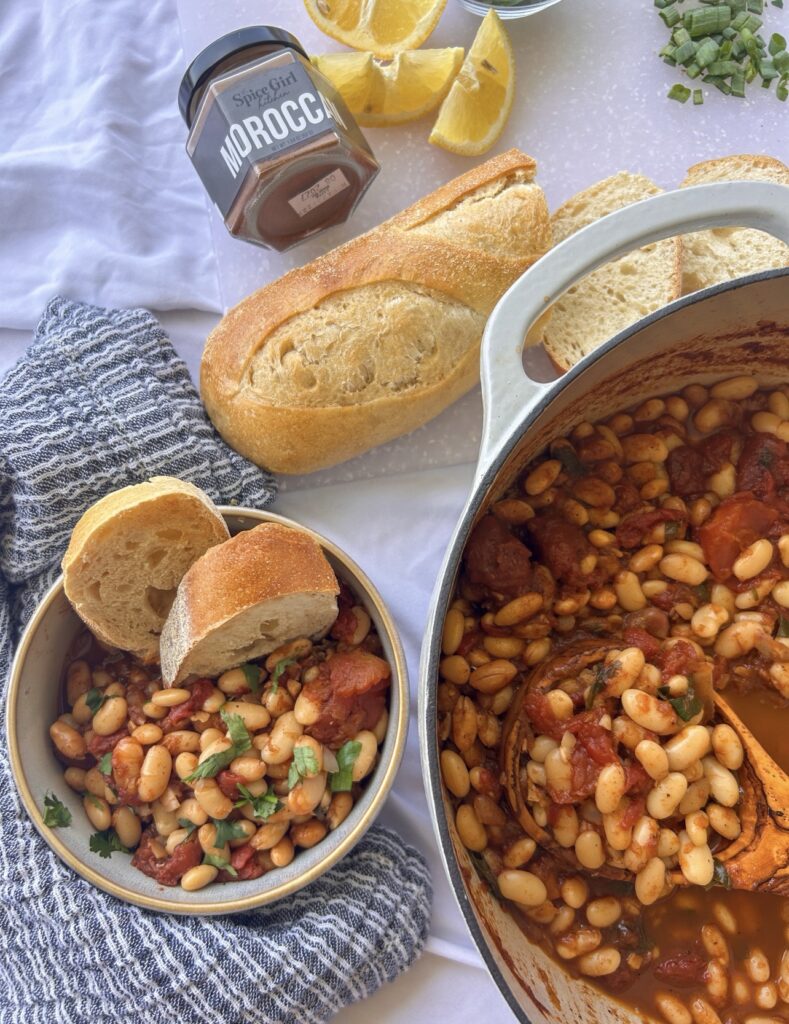 Moroccan white bean stew served with crusty bread for dipping