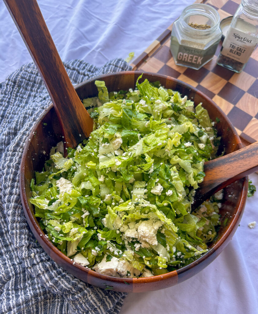 Fresh Greek lettuce salad served with feta, dill, and lemon vinaigrette