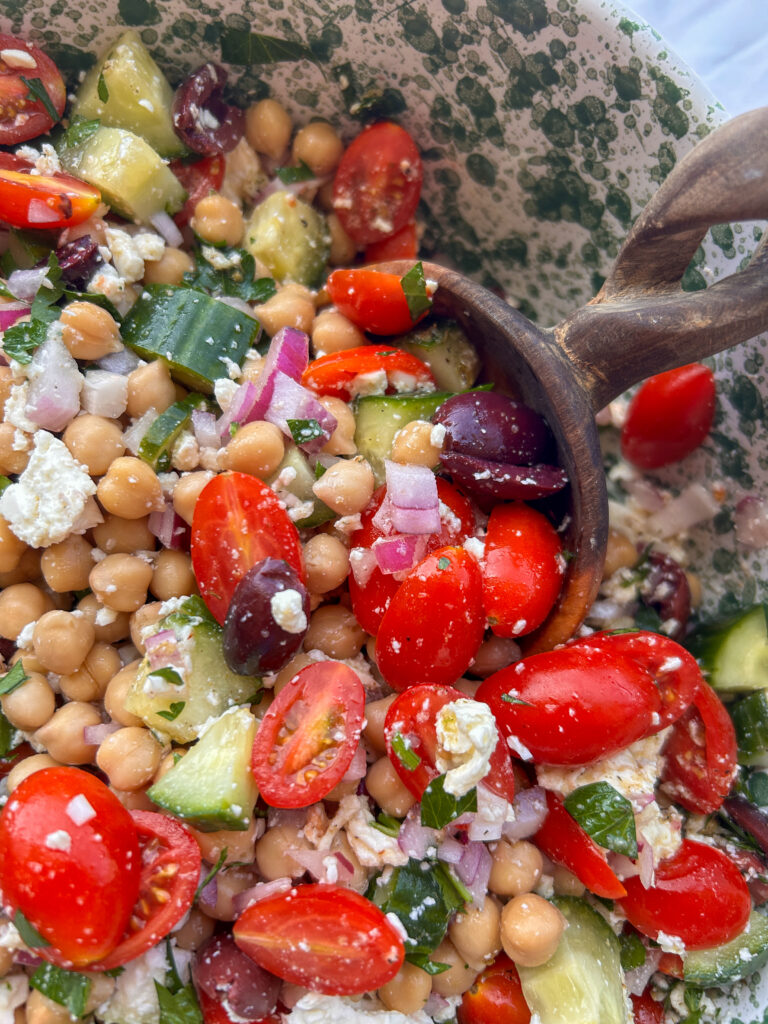 Greek chickpea feta salad tossed with homemade Greek vinaigrette until evenly coated