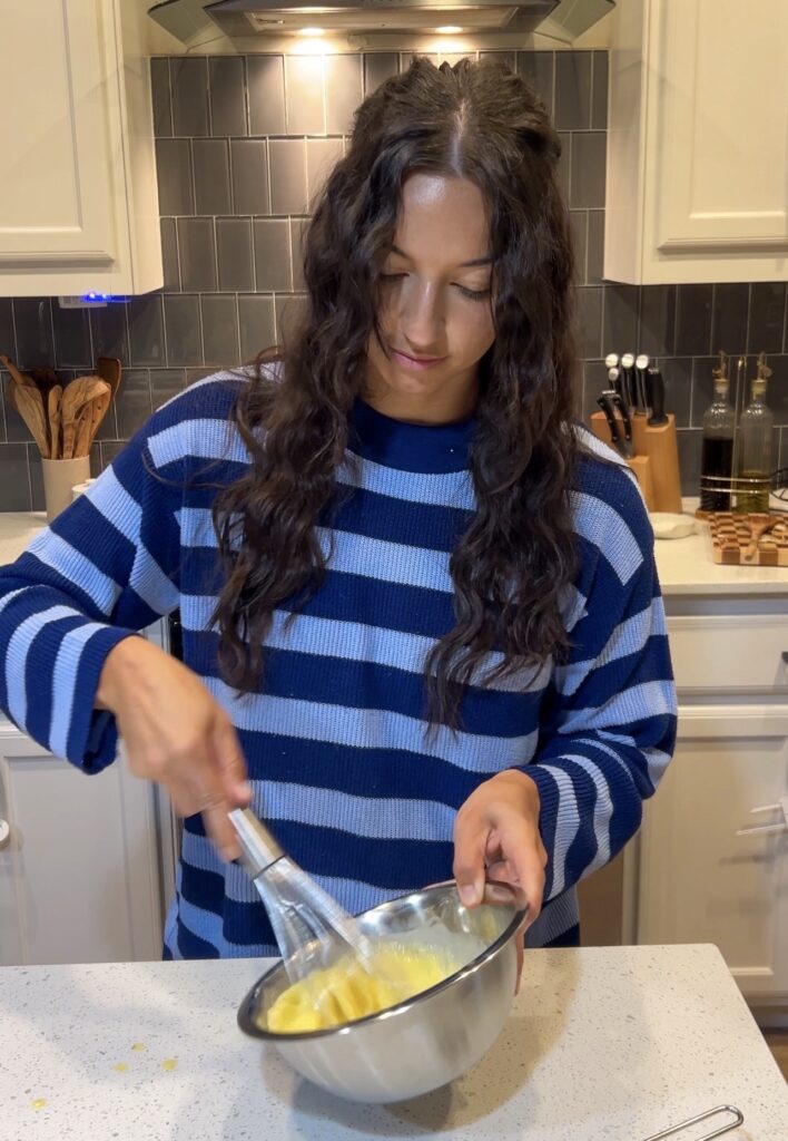 Eggs and fresh lemon juice whisked together for Avgolemono soup