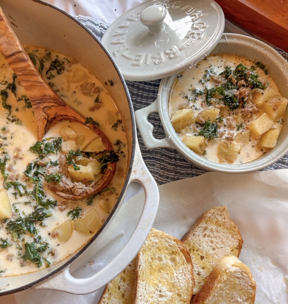 Easy Olive Garden Zuppa Toscana soup with Italian sausage, tender potatoes, kale, and Parmesan